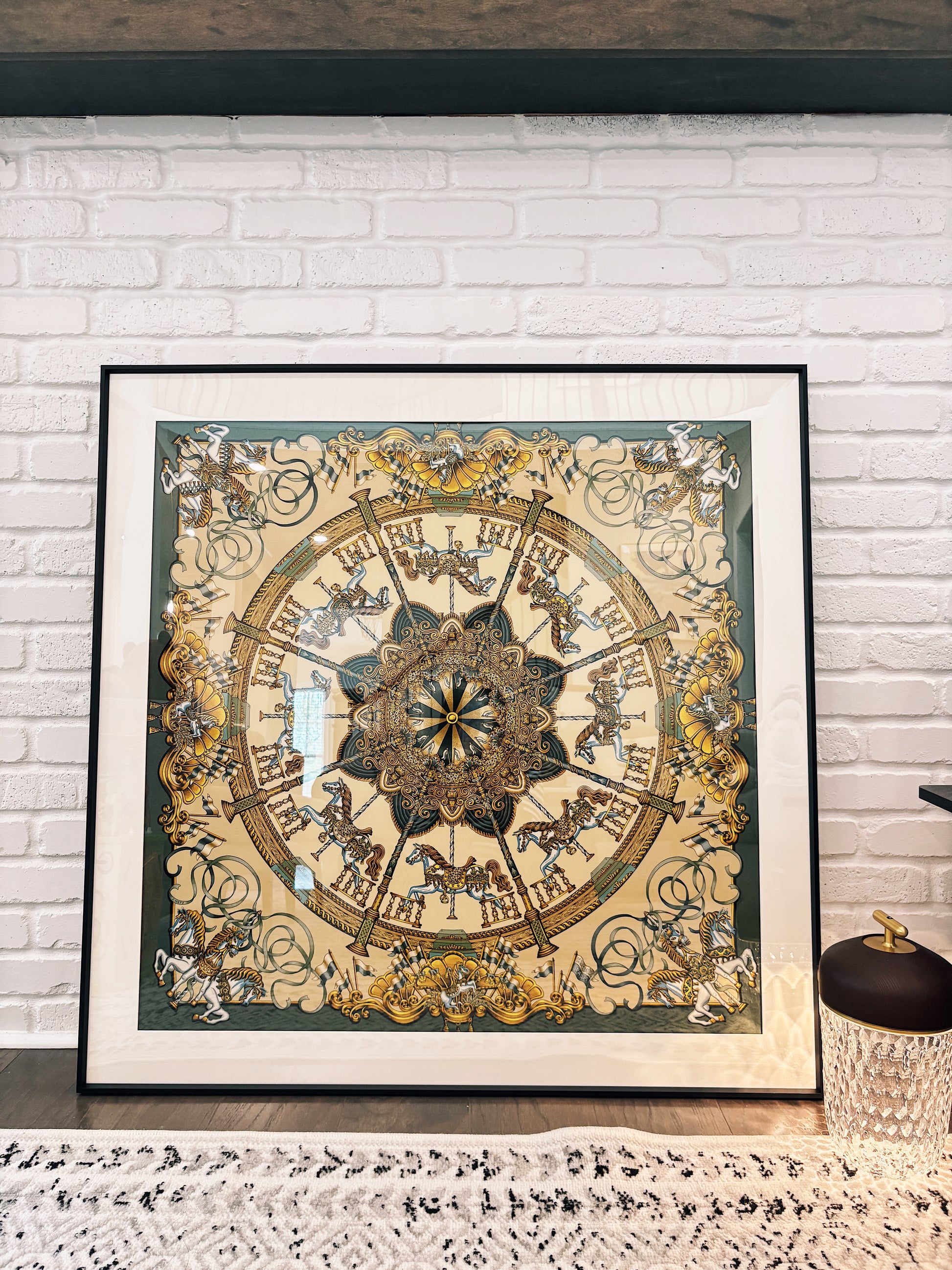 Luxury silk scarf display frame with matte black finish and couture patterned matting, ideal for framing Hermes or other designer scarves.